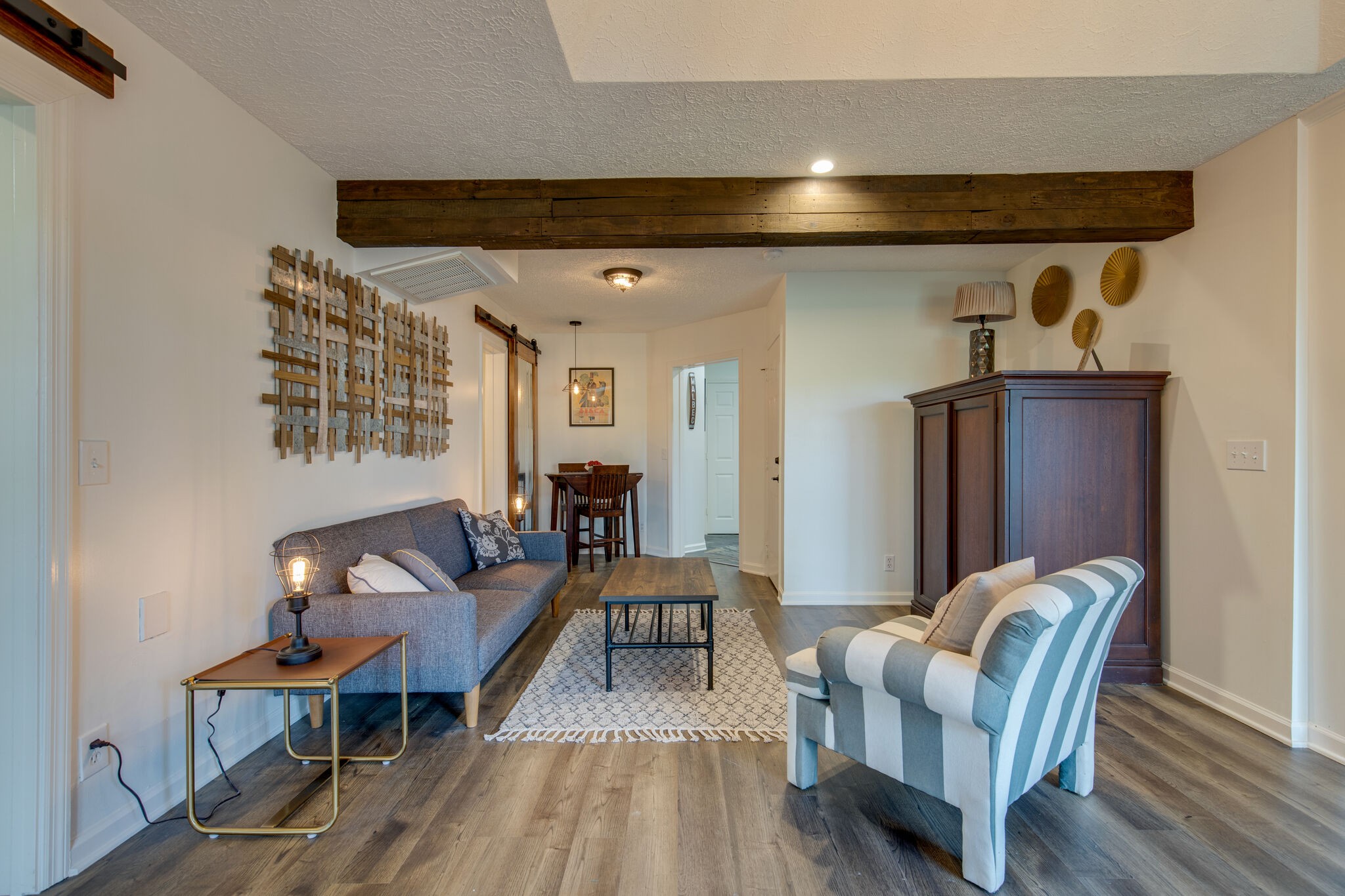 5236 Ridgefalls Way Antioch, TN 37013 - Photo 26 of 35 a living room with furniture and a wooden floor