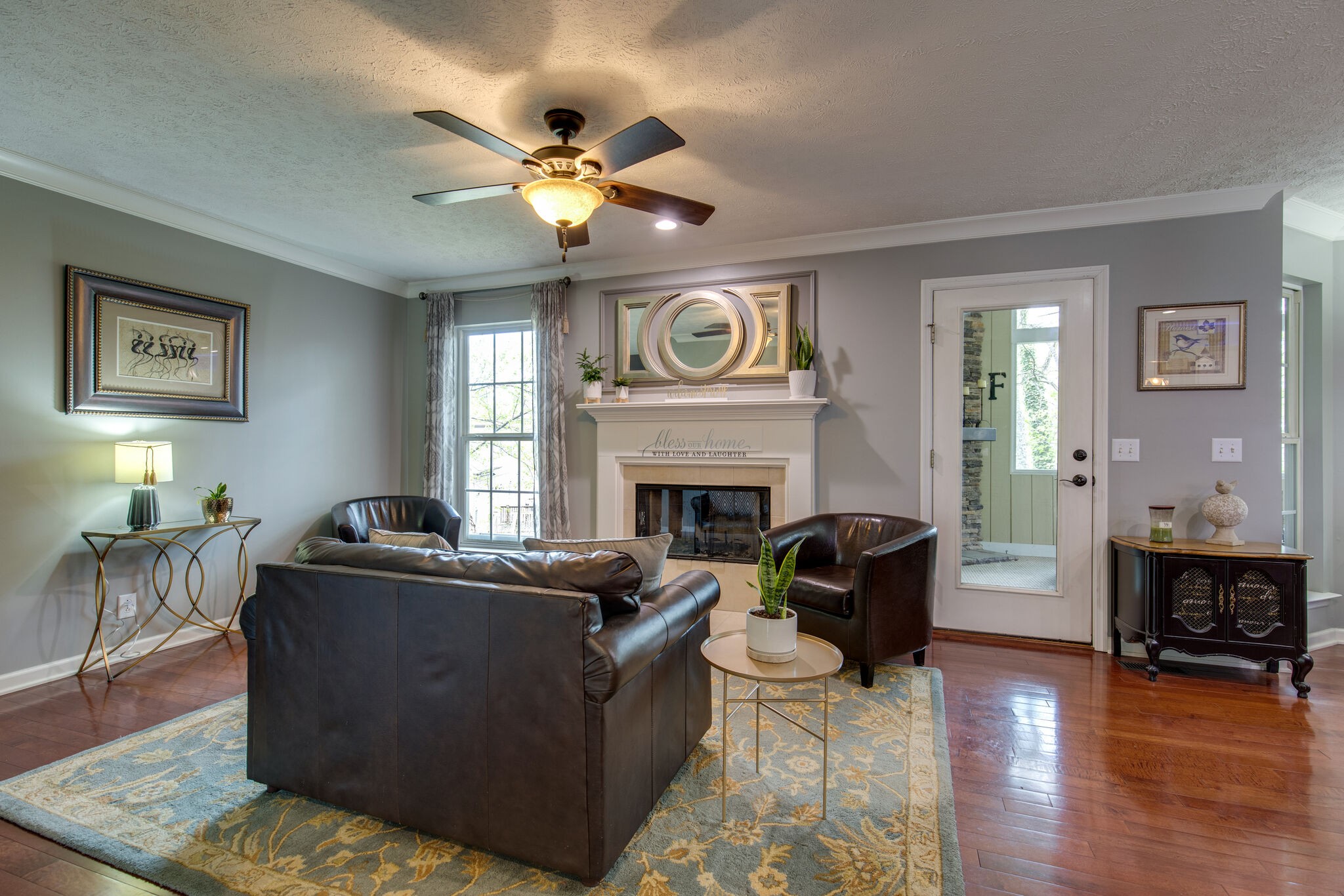5236 Ridgefalls Way Antioch, TN 37013 - Photo 8 of 35 a living room with furniture and a fireplace