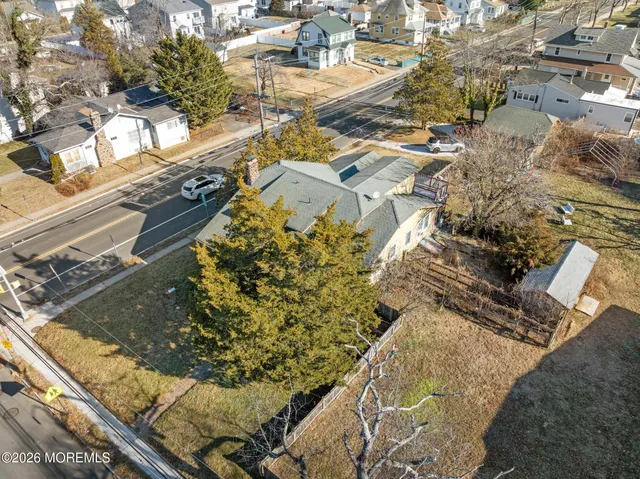 a view of swimming pool with outdoor seating