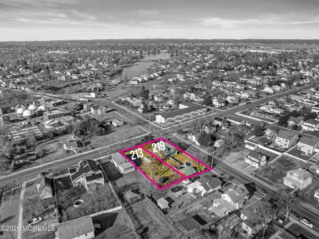 an aerial view of residential building with parking space