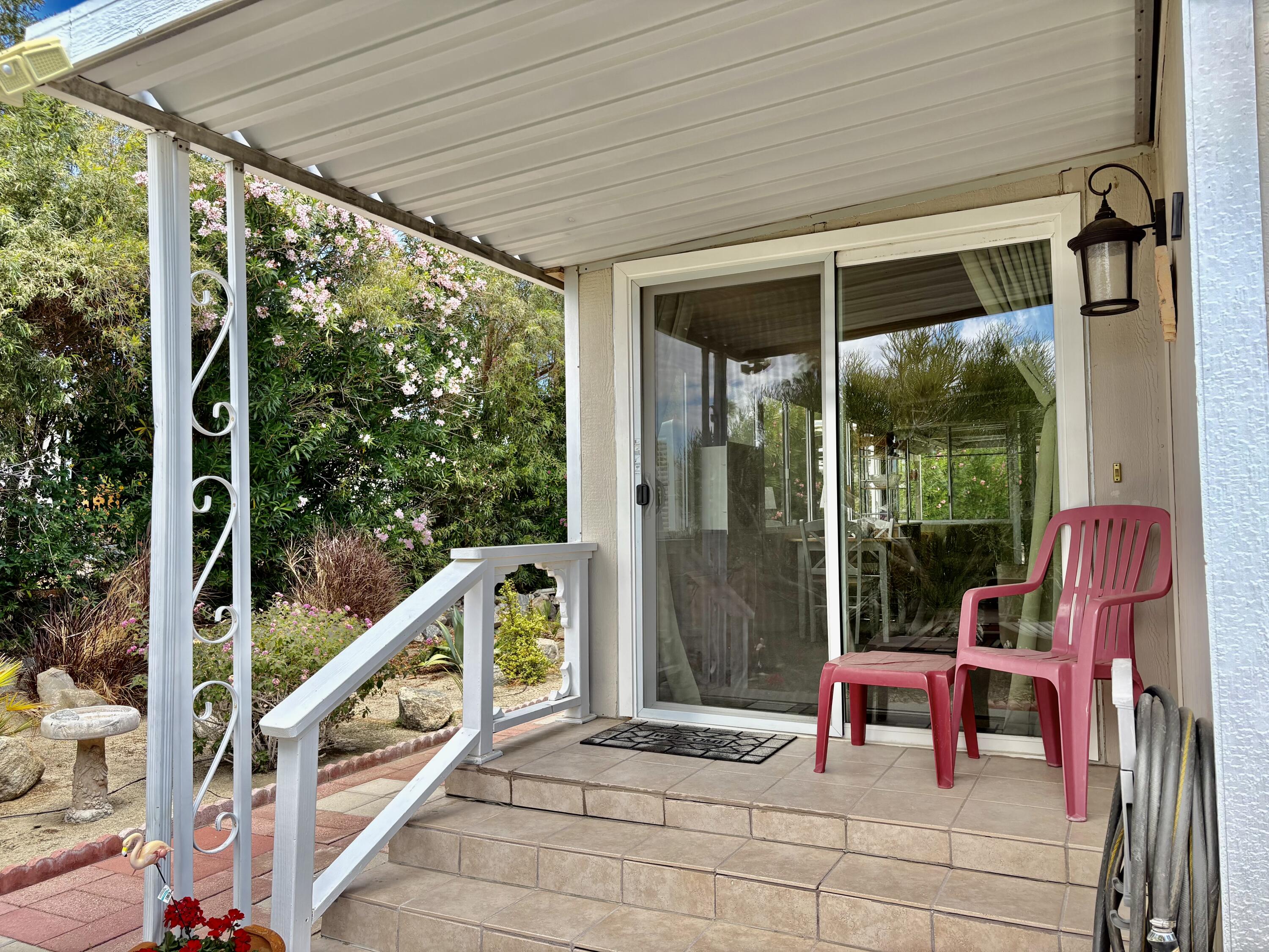 74711 Dillon Road, Unit 635 Desert Hot Springs, CA 92241 - Photo 27 of 55 a building outdoor space with seating