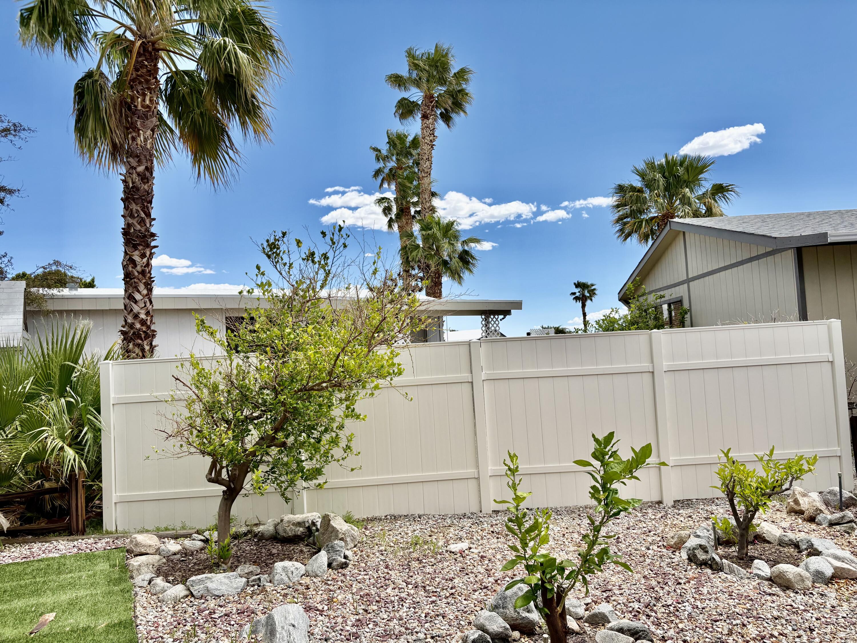 74711 Dillon Road, Unit 635 Desert Hot Springs, CA 92241 - Photo 31 of 55 a view of a flower in a yard