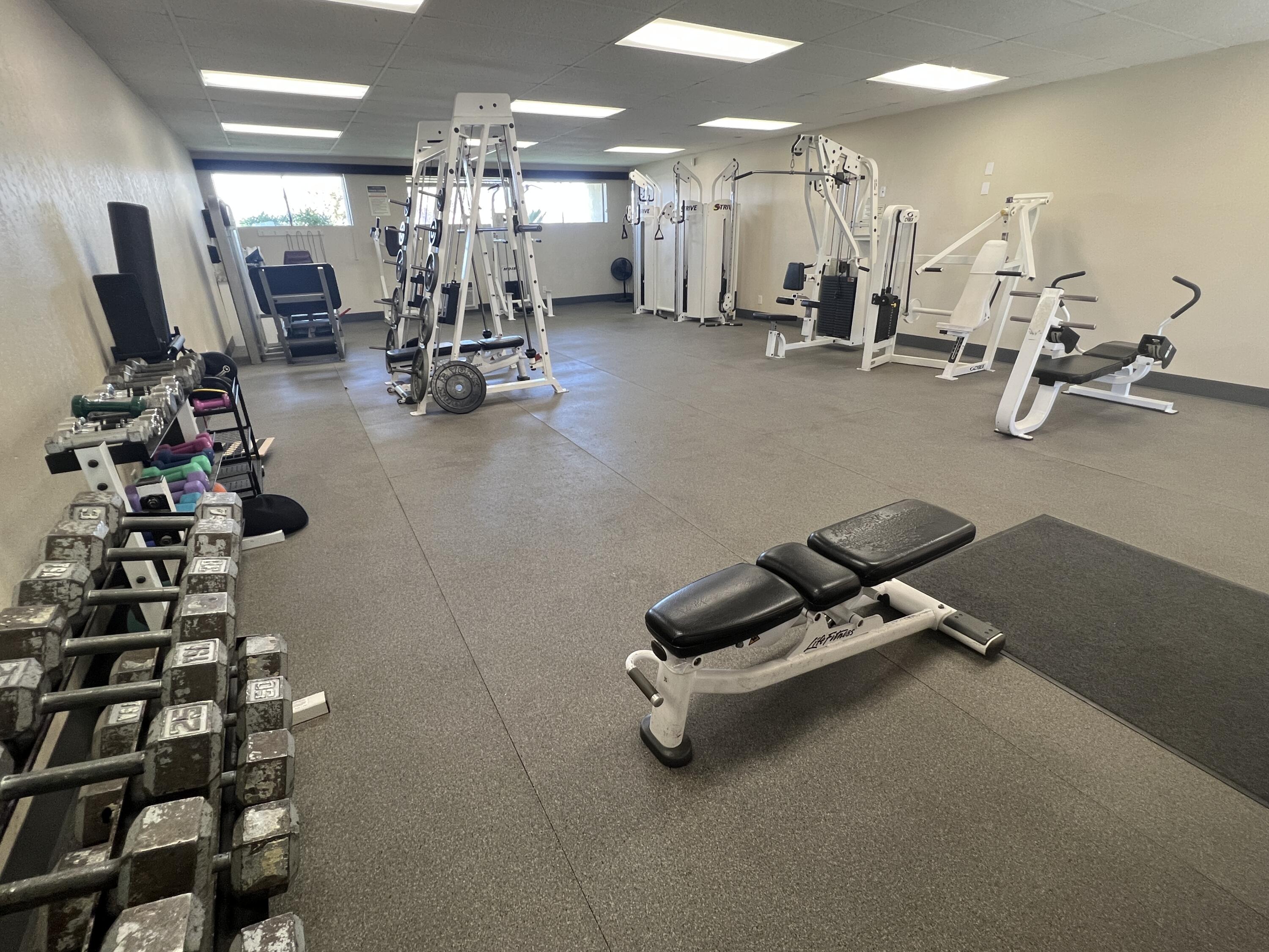 74711 Dillon Road, Unit 635 Desert Hot Springs, CA 92241 - Photo 43 of 55 a room with gym equipment and equipment