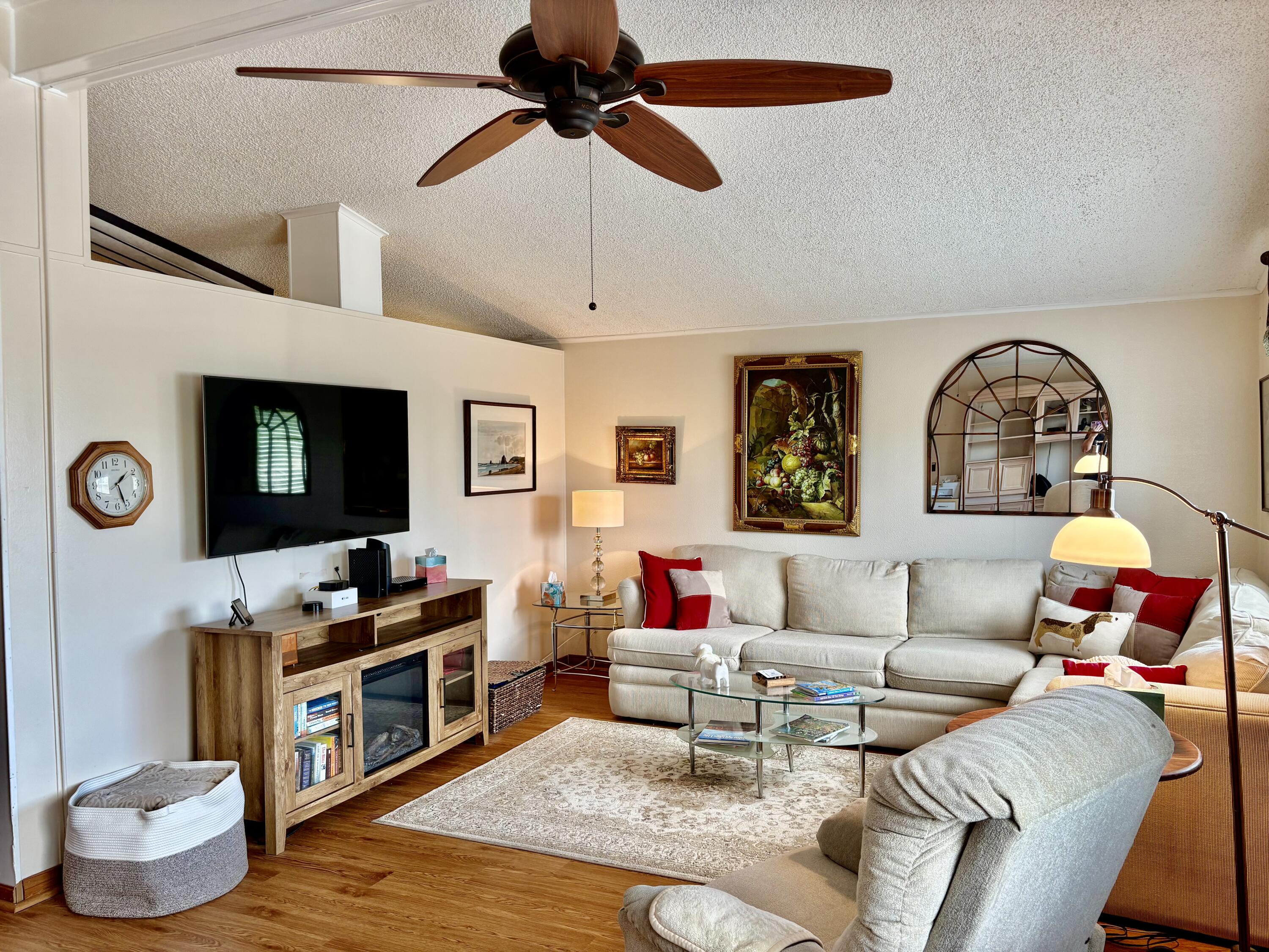74711 Dillon Road, Unit 635 Desert Hot Springs, CA 92241 - Photo 6 of 55 a living room with furniture and a flat screen tv