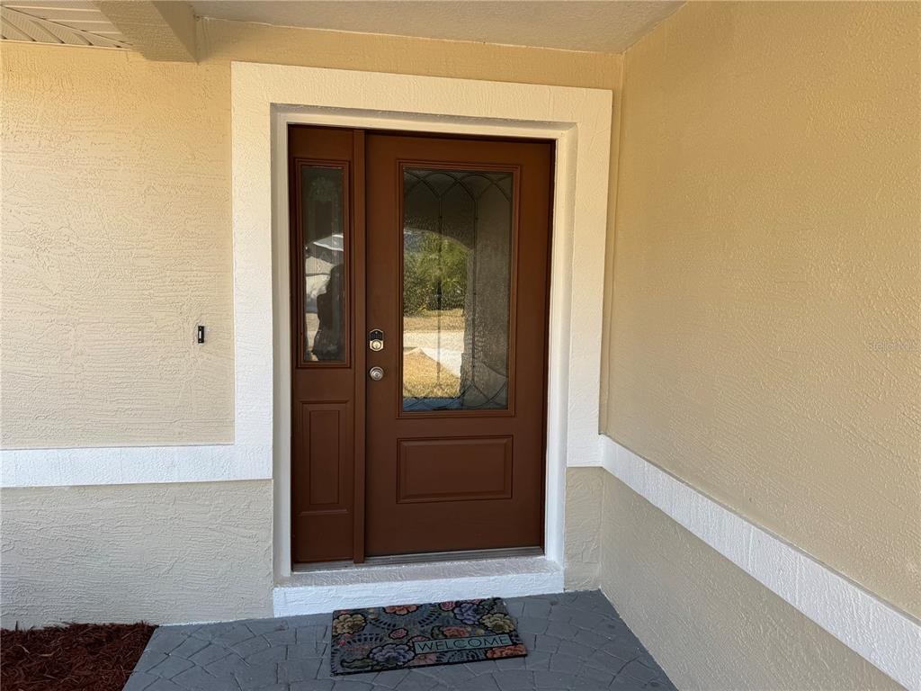 30 Patuxent Lane Palm Coast, FL 32164 - Photo 14 of 34 a view of front door