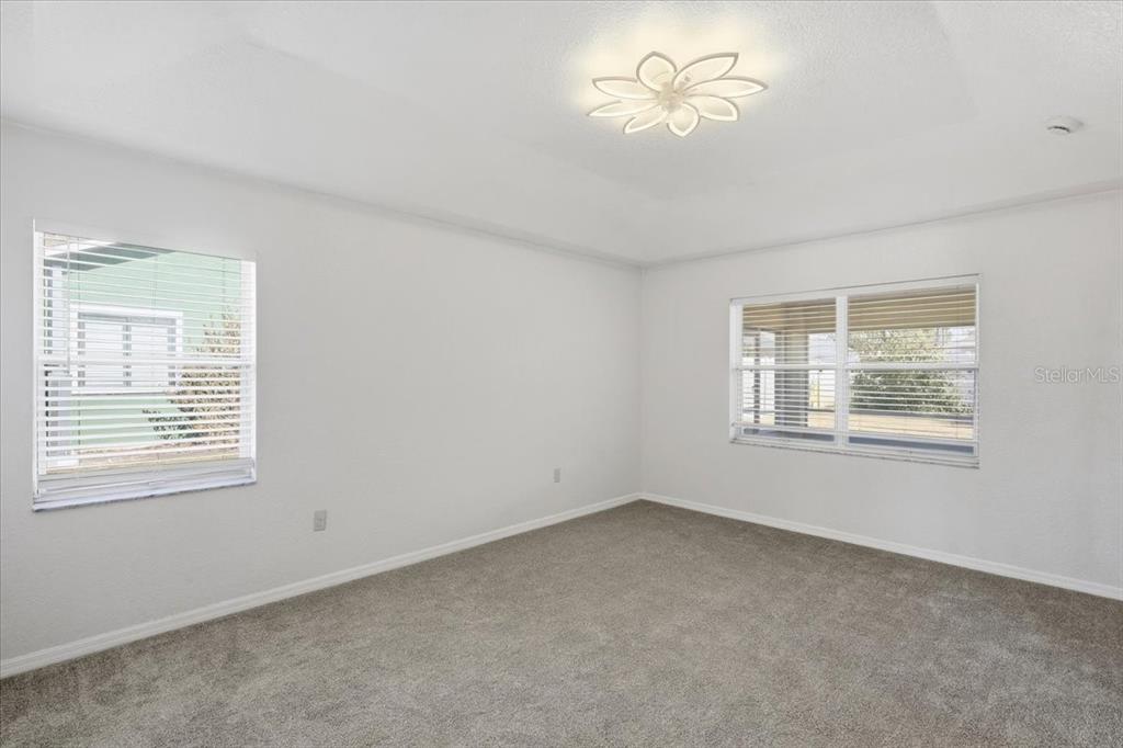 30 Patuxent Lane Palm Coast, FL 32164 - Photo 15 of 34 a view of an empty room with a window