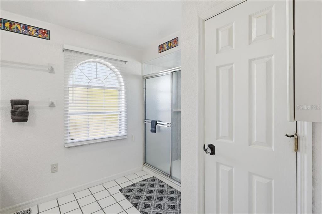 30 Patuxent Lane Palm Coast, FL 32164 - Photo 17 of 34 a view of a bathroom with a window