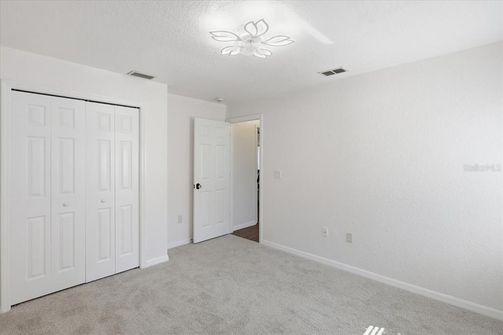 30 Patuxent Lane Palm Coast, FL 32164 - Photo 19 of 34 wooden floor in an empty room
