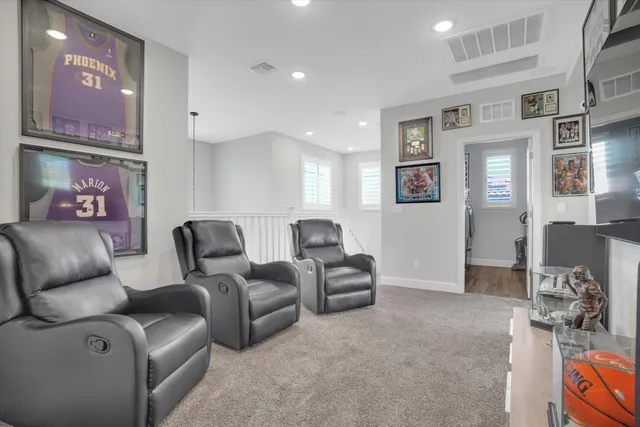 a living room with furniture and a couch