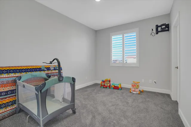 a room with toys and a wooden floor