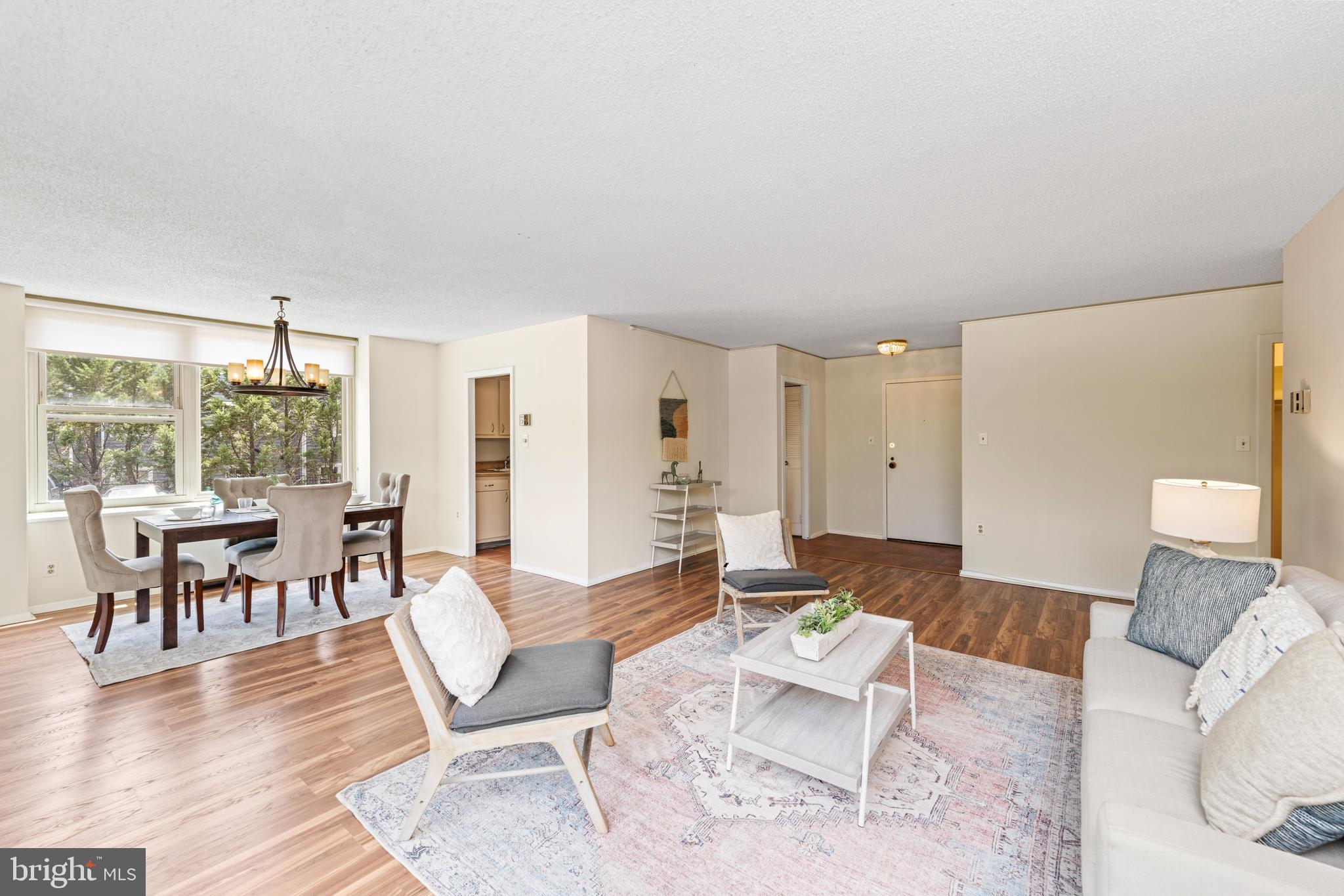 4401 Roland Avenue, Unit 115 Baltimore, MD 21210 - Photo 19 of 54 a living room with furniture and wooden floor