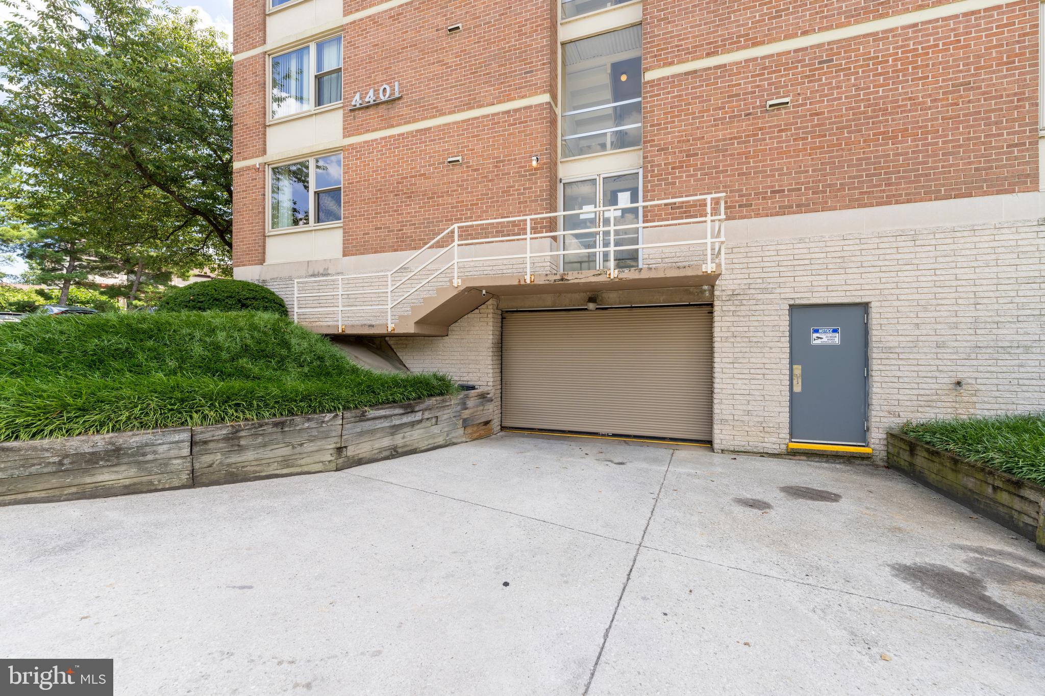 4401 Roland Avenue, Unit 115 Baltimore, MD 21210 - Photo 46 of 54 a view of a brick house with a street