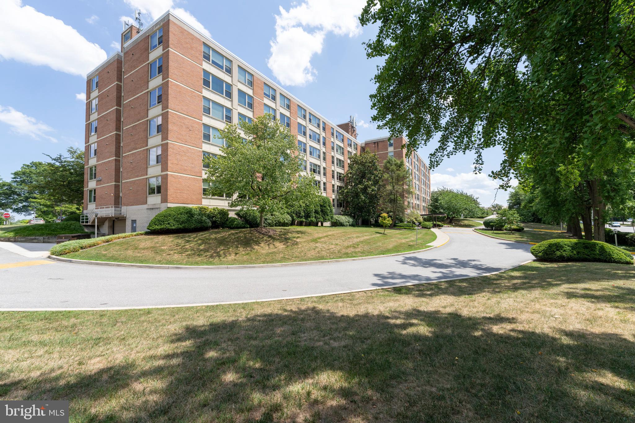 4401 Roland Avenue, Unit 115 Baltimore, MD 21210 - Photo 47 of 54 a view of building with yard