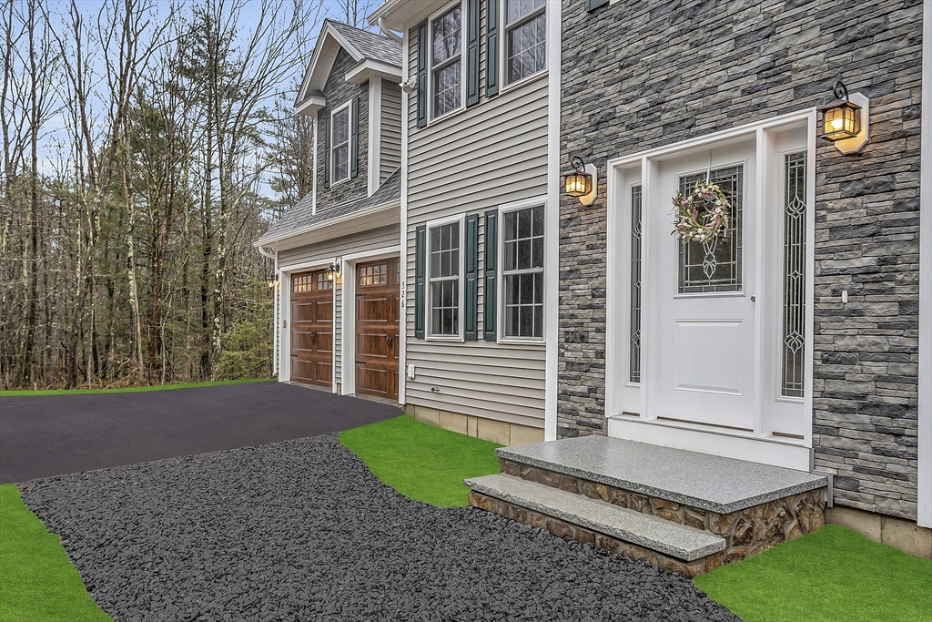 236 Davis Road, Unit APPLEWOOD Westminster, MA 01473 - Photo 7 of 42 a front view of a house with a yard