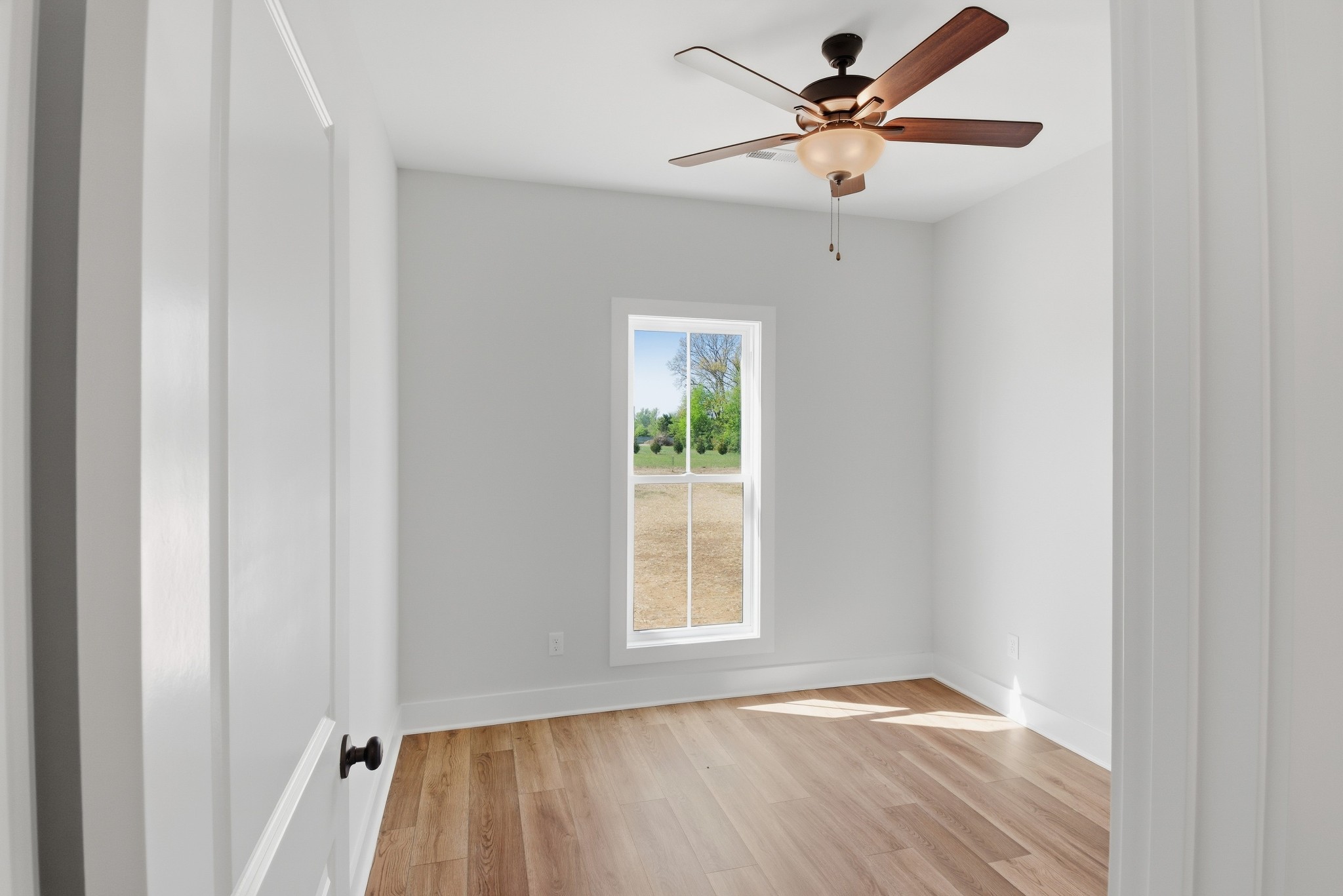 4335 Bybee Branch Road McMinnville, TN 37110 - Photo 20 of 25 a view of an empty room with a window