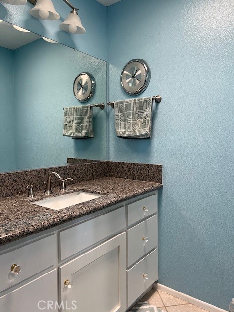 1085 Pauma Valley Road Banning, CA 92220 - Photo 13 of 18 a bathroom with a sink and a mirror