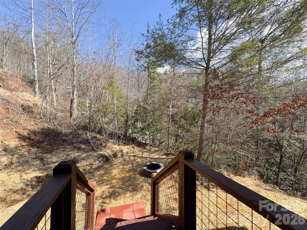 a view of a balcony with wooden floor
