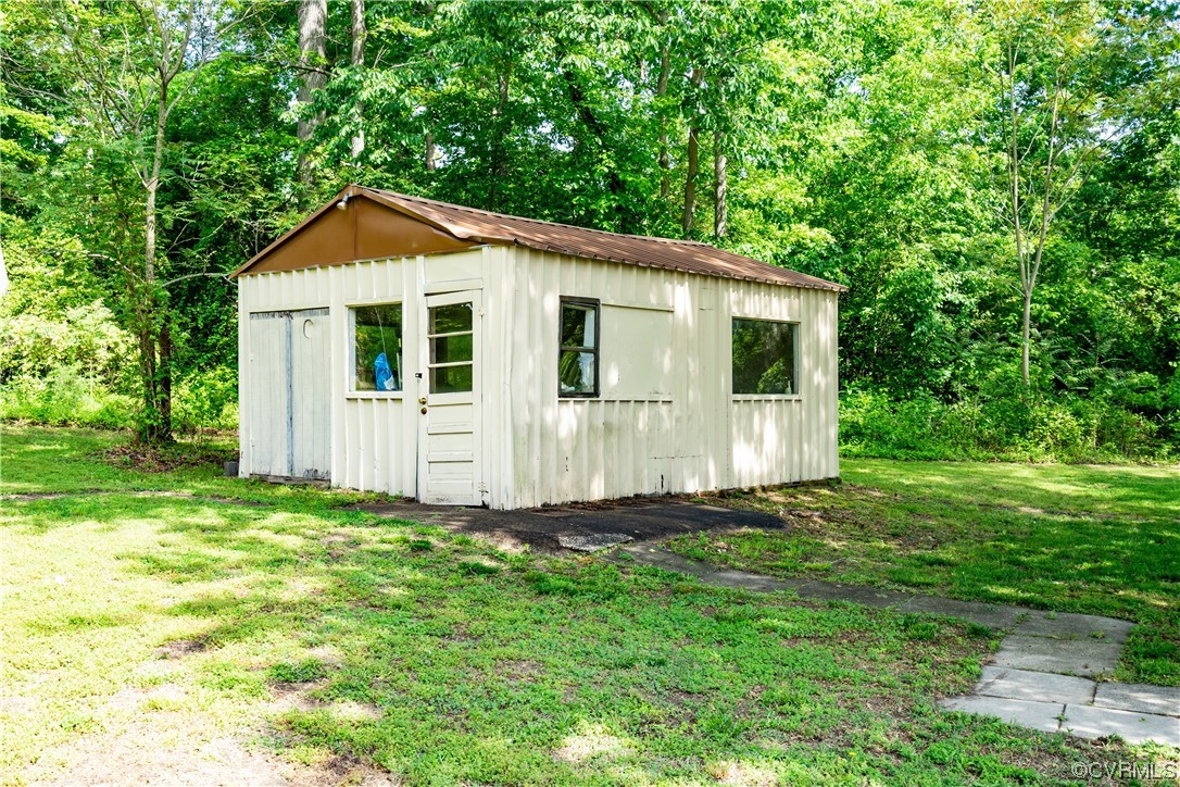 5800 Newbys Bridge Road Chesterfield, VA 23832 - Photo 26 of 29 a view of front of house with a yard