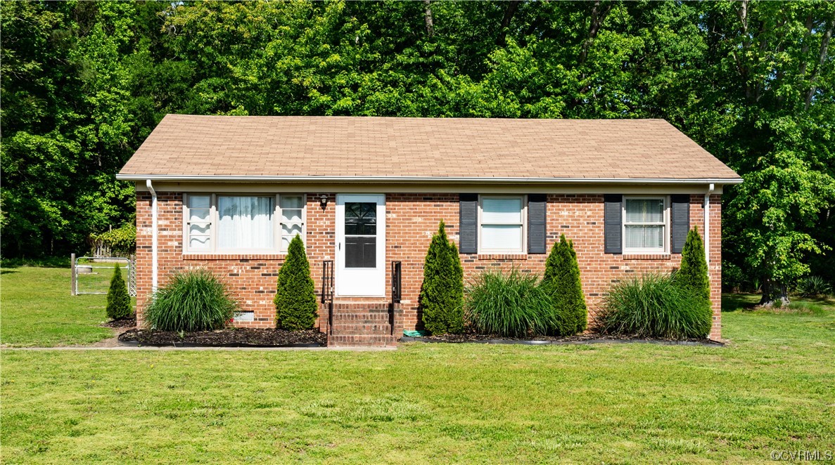 5800 Newbys Bridge Road Chesterfield, VA 23832 - Photo 3 of 29 a house with a garden