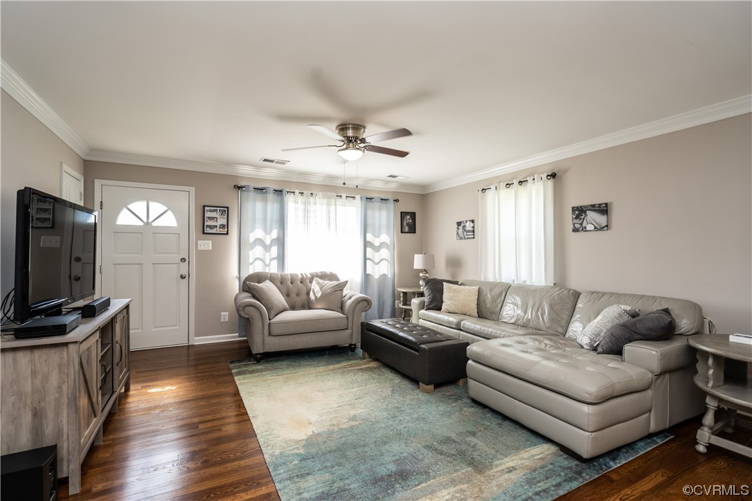 5800 Newbys Bridge Road Chesterfield, VA 23832 - Photo 4 of 29 a living room with furniture a rug and a flat screen tv