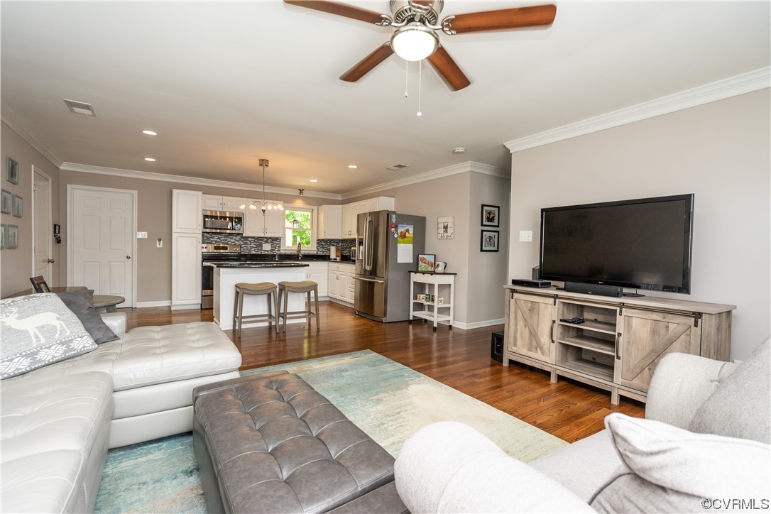5800 Newbys Bridge Road Chesterfield, VA 23832 - Photo 5 of 29 a living room with furniture and a flat screen tv