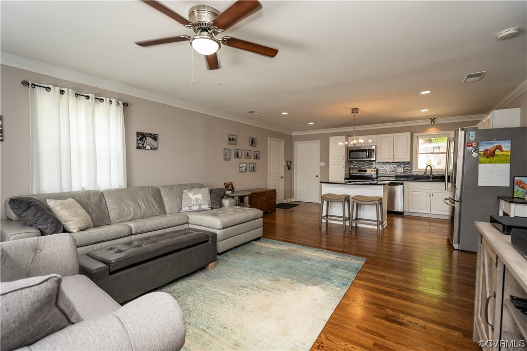 5800 Newbys Bridge Road Chesterfield, VA 23832 - Photo 6 of 29 a living room with furniture and kitchen view
