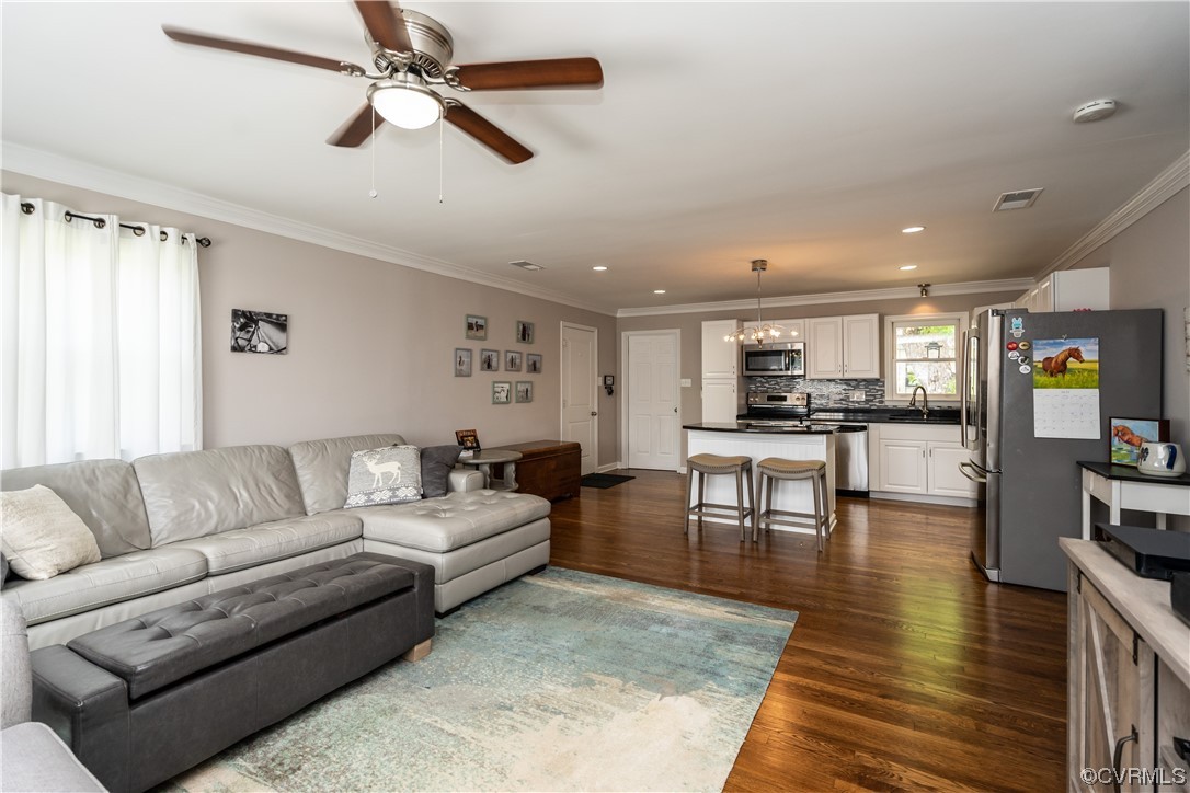 5800 Newbys Bridge Road Chesterfield, VA 23832 - Photo 7 of 29 a living room with furniture and view of kitchen