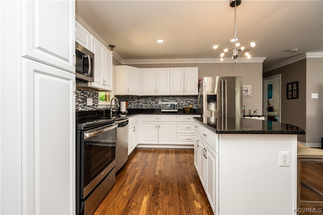 5800 Newbys Bridge Road Chesterfield, VA 23832 - Photo 10 of 29 a kitchen with a sink stove and refrigerator