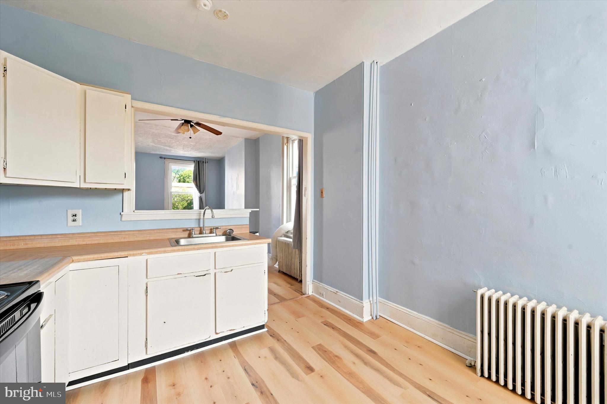 204 Ripka Street, Unit 2 Philadelphia, PA 19127 - Photo 7 of 22 a view of a kitchen from the hallway