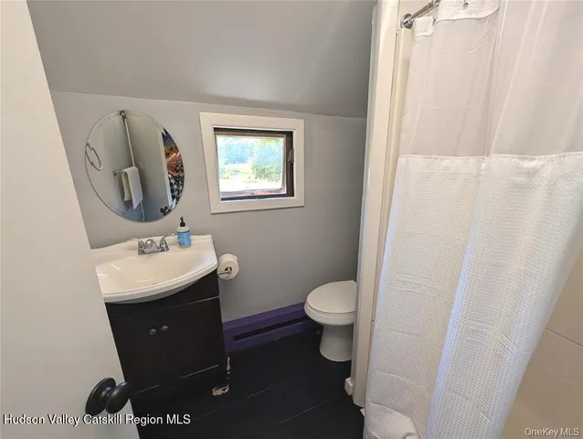 a view of a lake with a yard