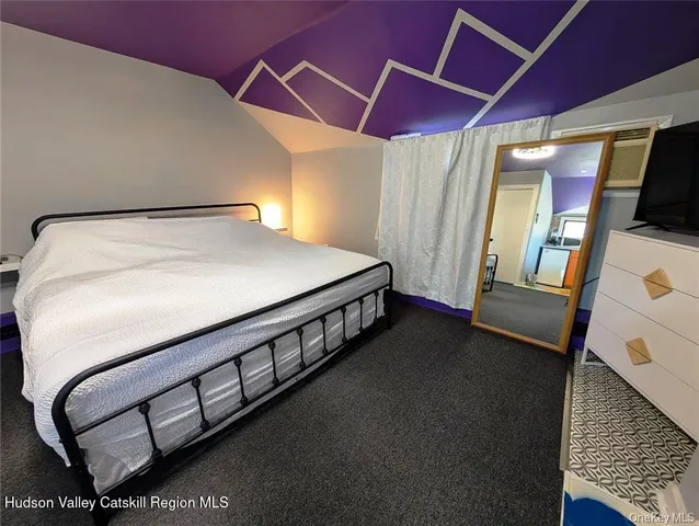 a kitchen with table and chairs