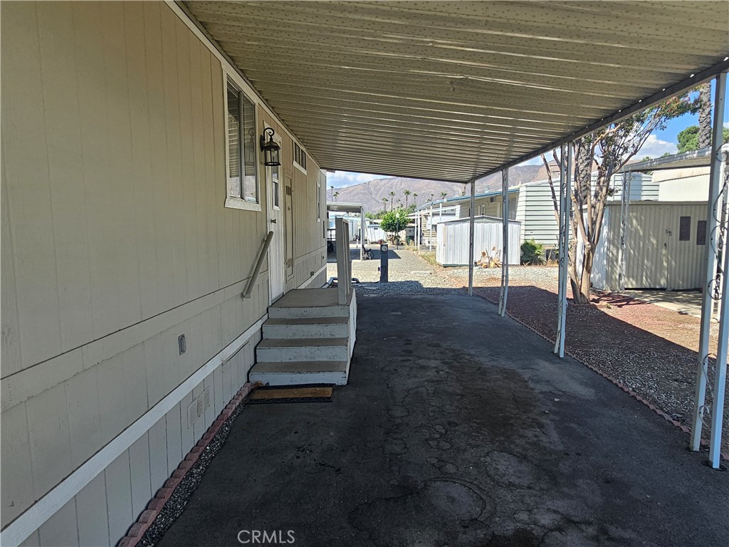 999 South Santa Fe Avenue, Unit 86 San Jacinto, CA 92583 - Photo 4 of 23 a view of a porch with furniture