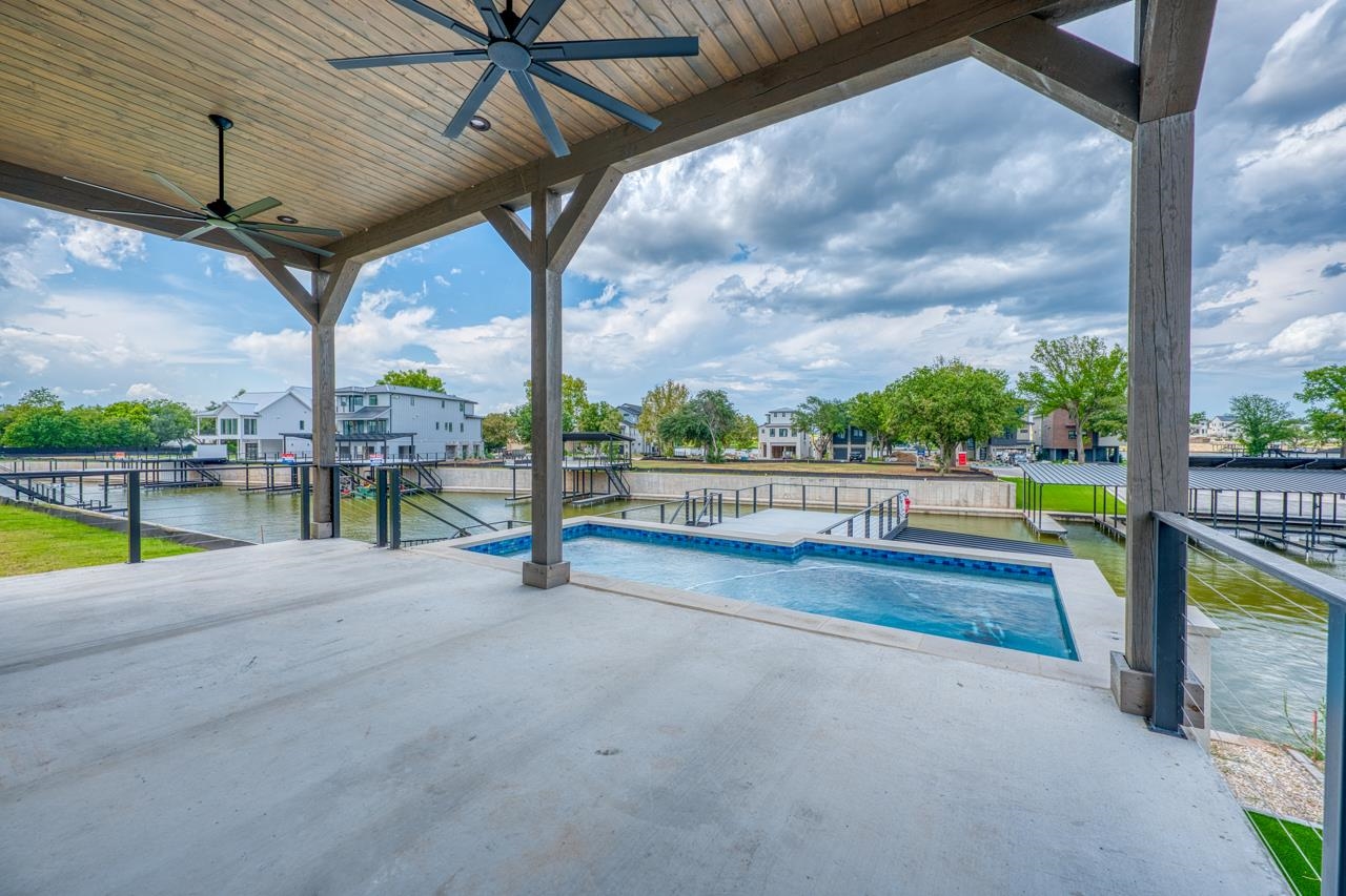 320 Lake Street Kingsland, TX 78639 - Photo 23 of 30 a view of a swimming pool with a porch