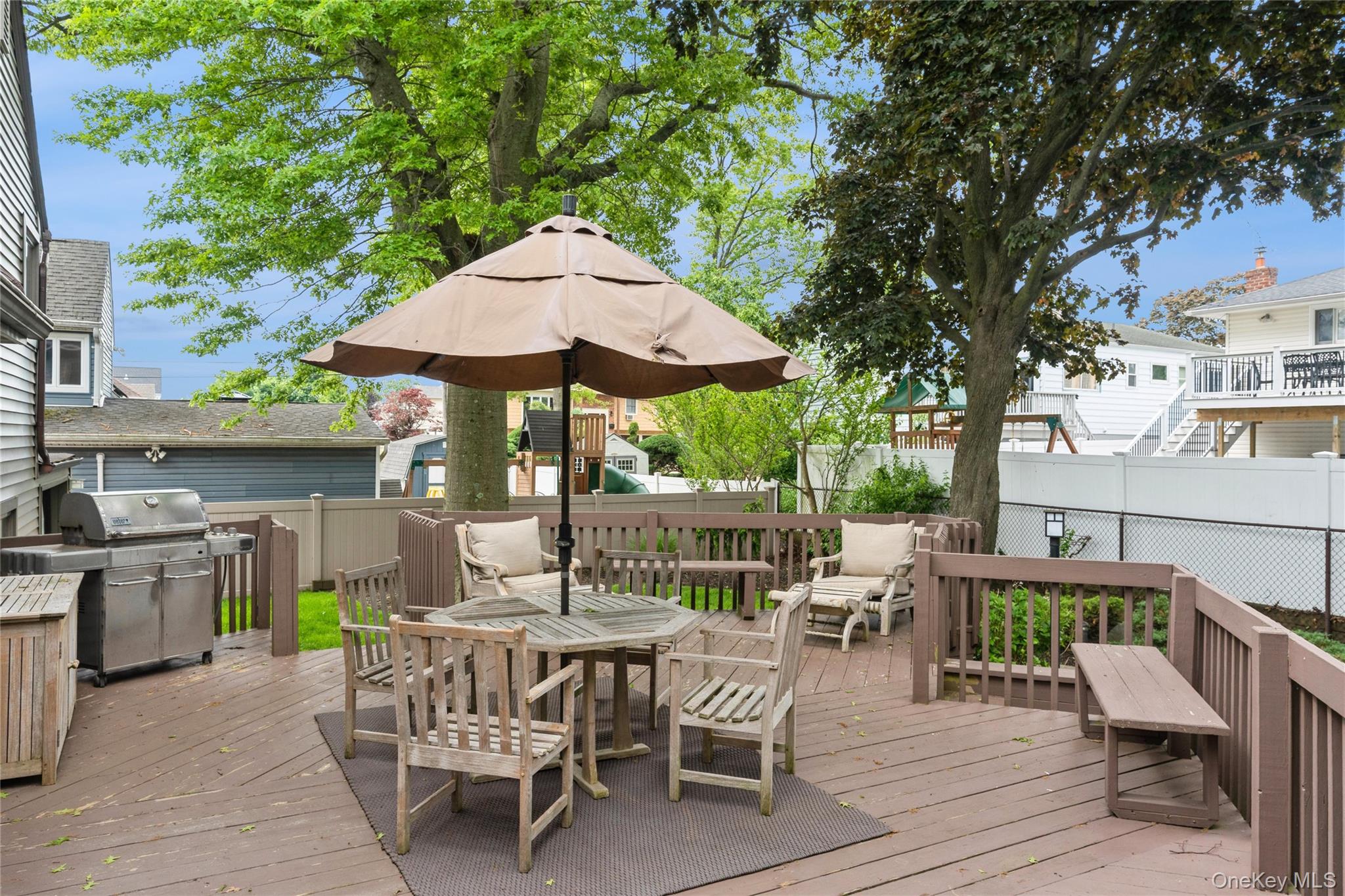 2772 Riverside Avenue Merrick, NY 11566 - Photo 24 of 45 a view of a patio with furniture and a backyard