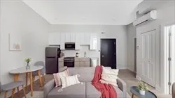 a bedroom with furniture and a bed