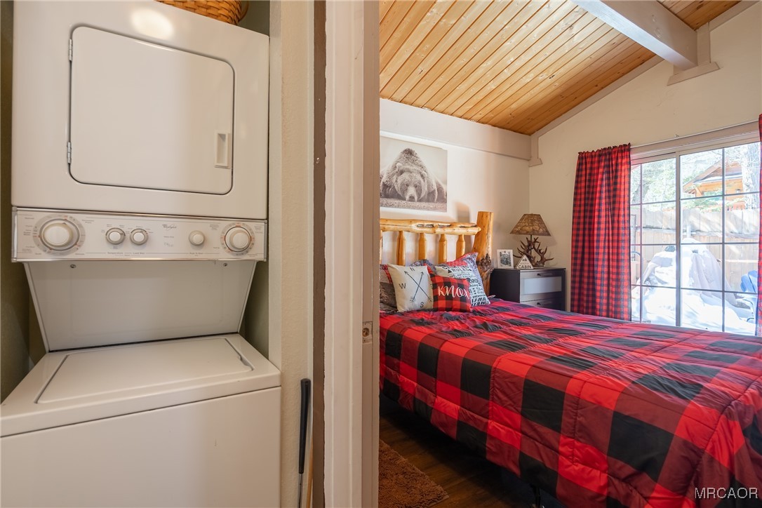 742 Cedar Lane Sugarloaf, CA 92386 - Photo 14 of 22 a bedroom with a bed a window and dresser