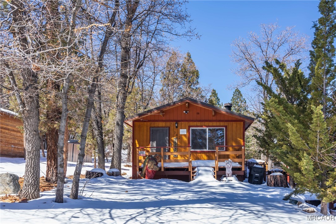 742 Cedar Lane Sugarloaf, CA 92386 - Photo 20 of 22 a front view of a house with a yard