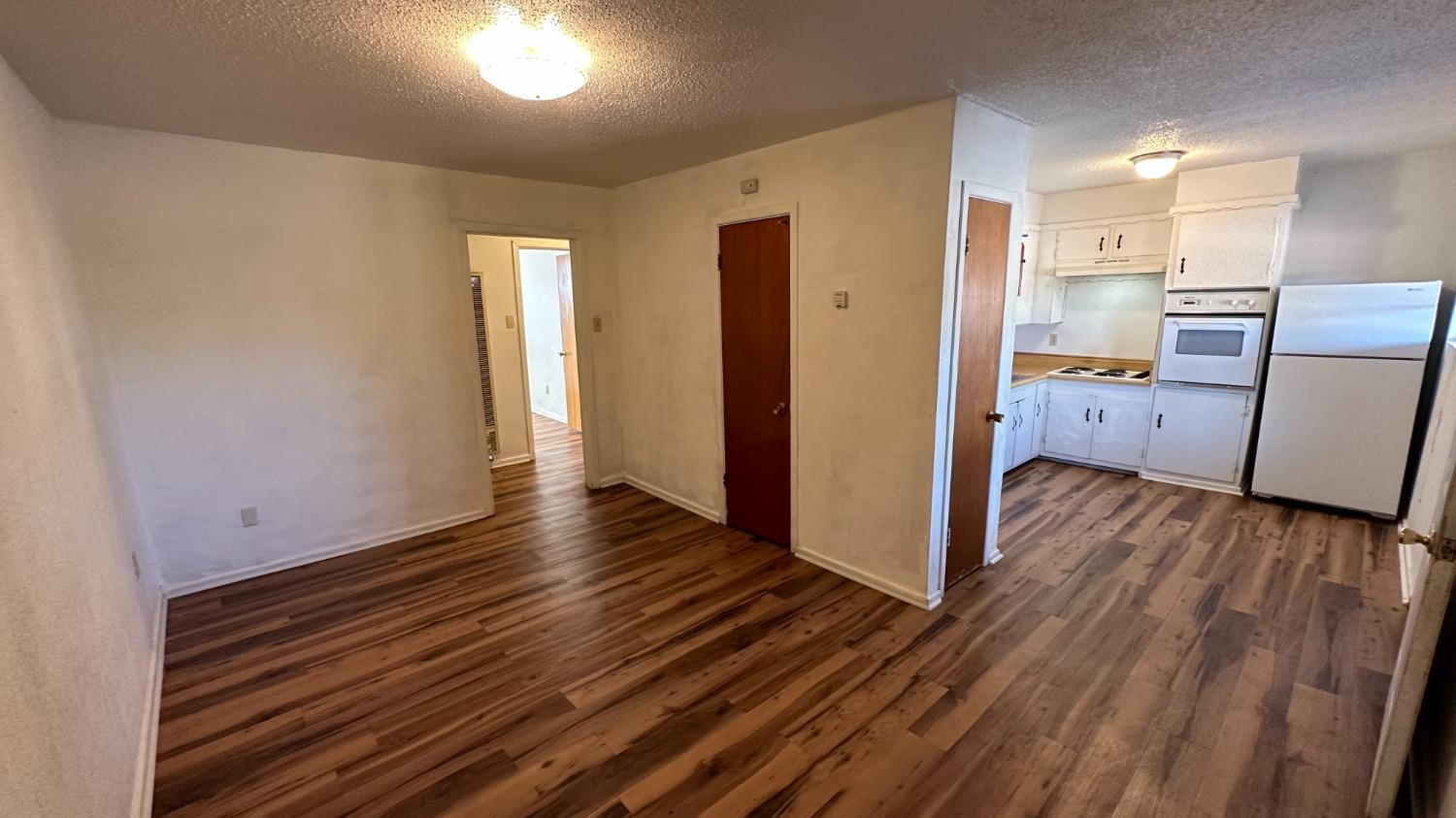 1014 Ave M Ralls, TX 79357 - Photo 6 of 13 a view of a room with wooden floor