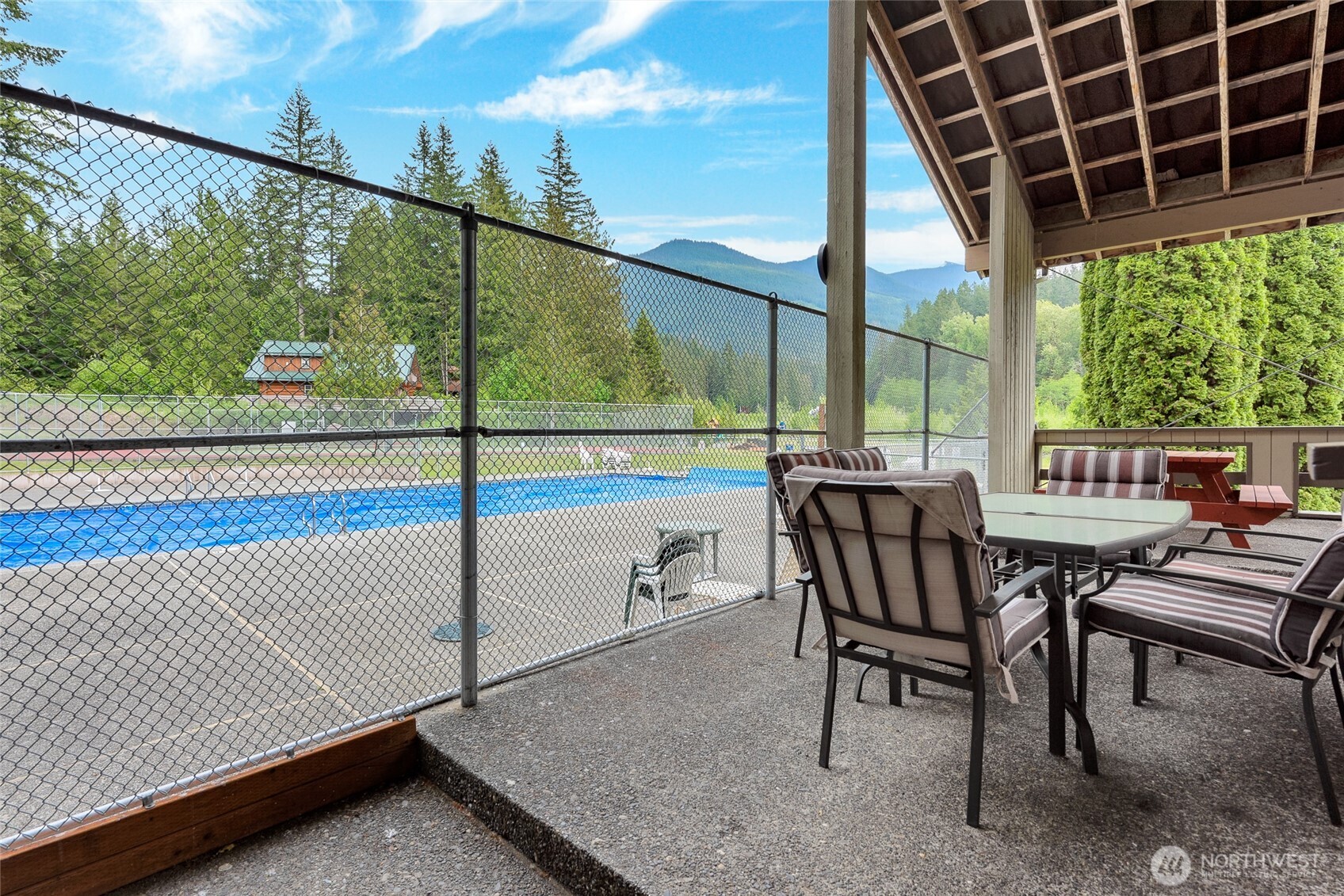 17045 Iceberg Road Glacier, WA 98244 - Photo 14 of 20 a view of a porch with furniture and wooden floor