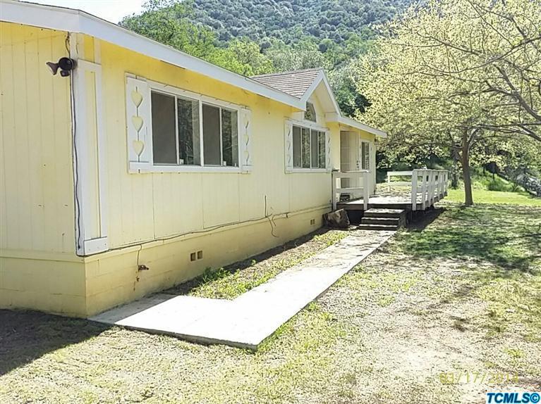 45472 Hammond Drive Three Rivers, CA 93271 - Photo 1 of 13 a view of a house with a yard
