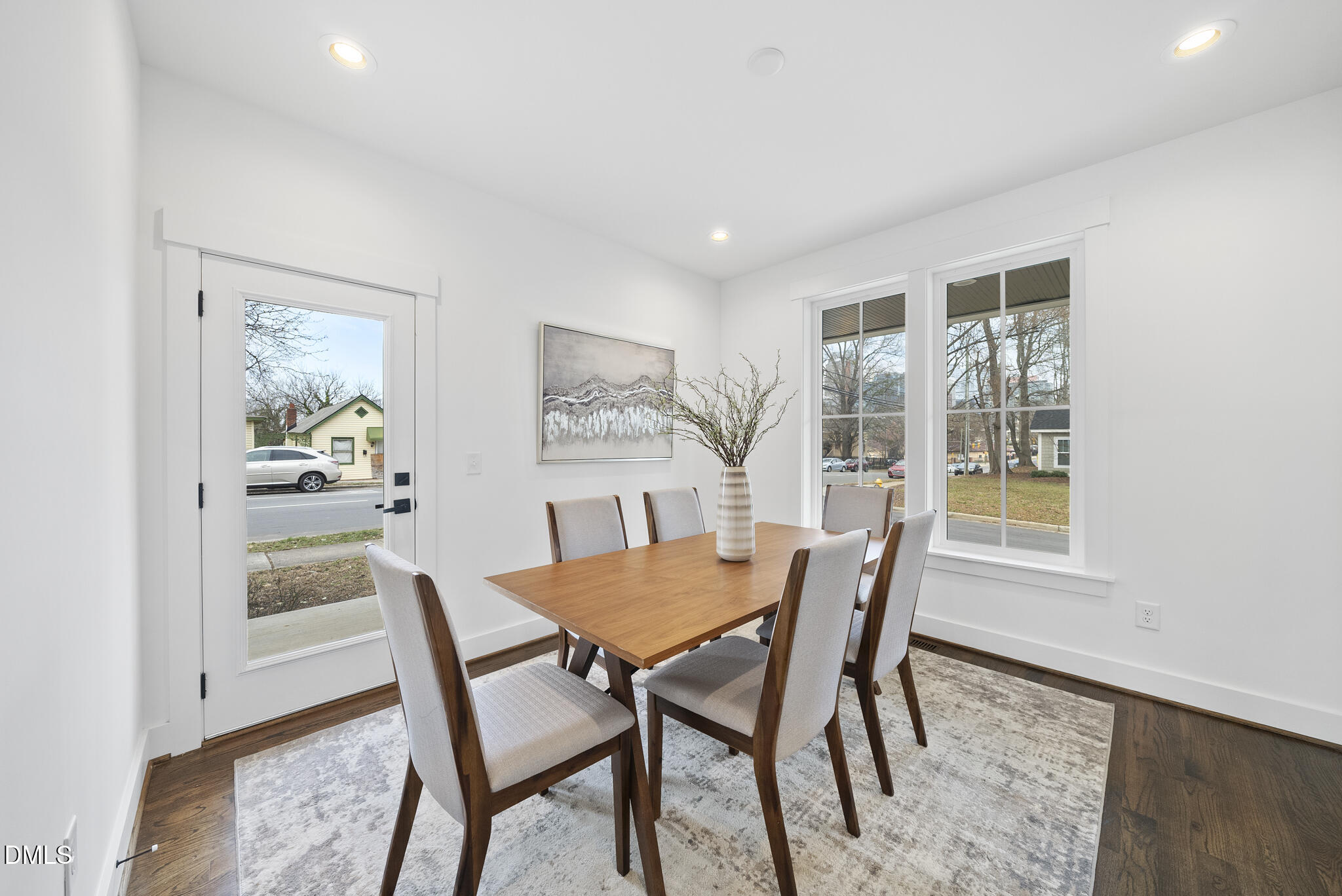 200 Bledsoe Avenue Raleigh, NC 27601 - Photo 14 of 42 a view of a dining room with furniture window and wooden floor