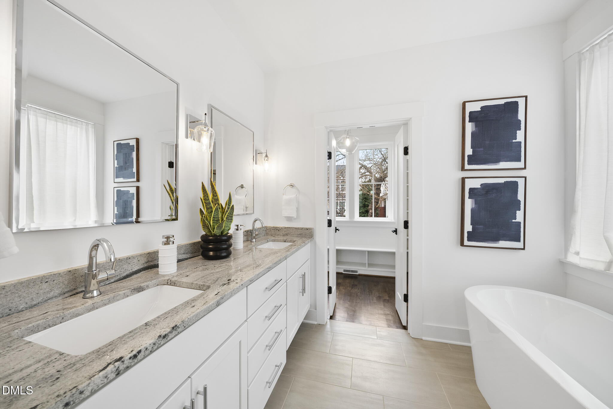 200 Bledsoe Avenue Raleigh, NC 27601 - Photo 18 of 42 a bathroom with a granite countertop sink mirror and a bathtub