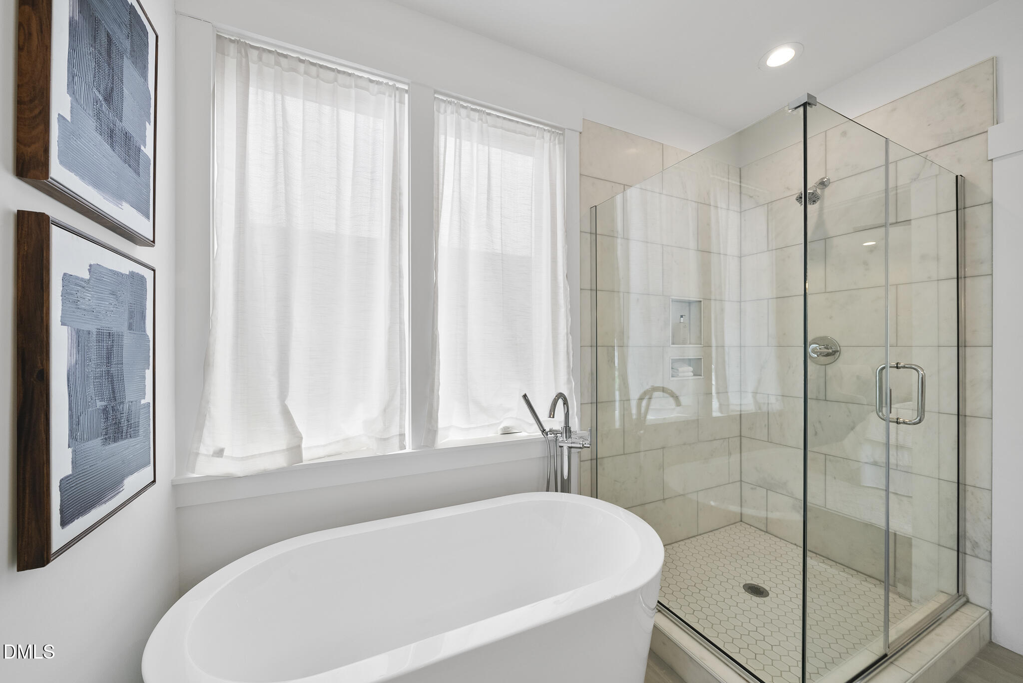 200 Bledsoe Avenue Raleigh, NC 27601 - Photo 19 of 42 a white bath tub sitting next to a shower