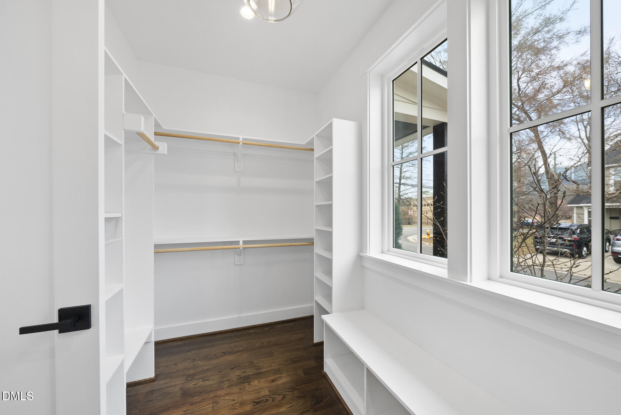 200 Bledsoe Avenue Raleigh, NC 27601 - Photo 21 of 42 a view of an empty room with wooden floor and a window
