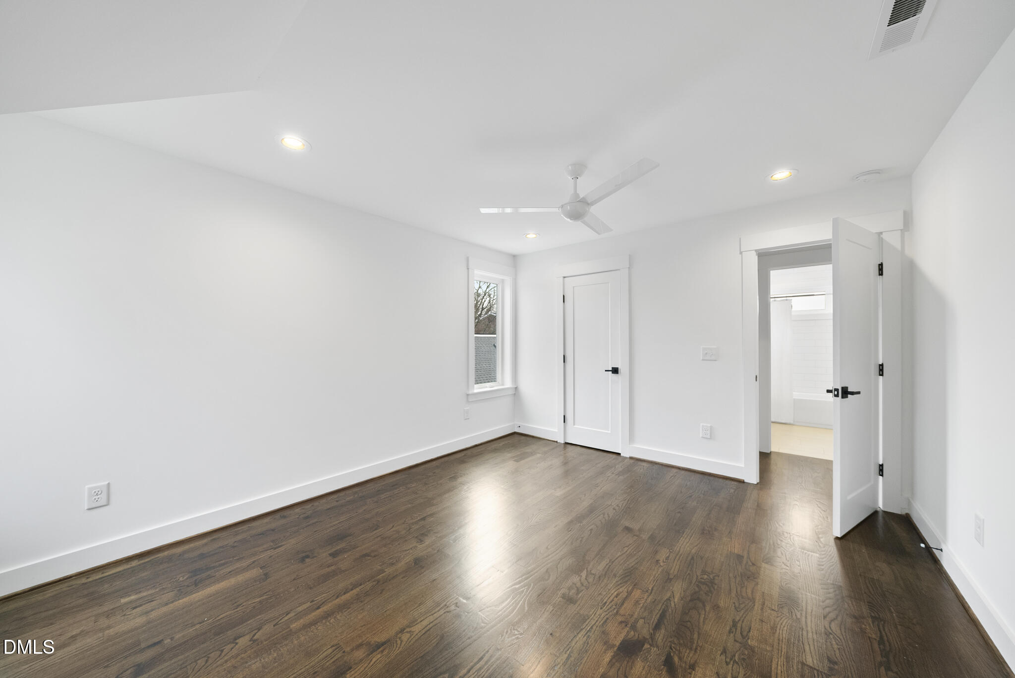 200 Bledsoe Avenue Raleigh, NC 27601 - Photo 34 of 42 a view of an empty room with wooden floor