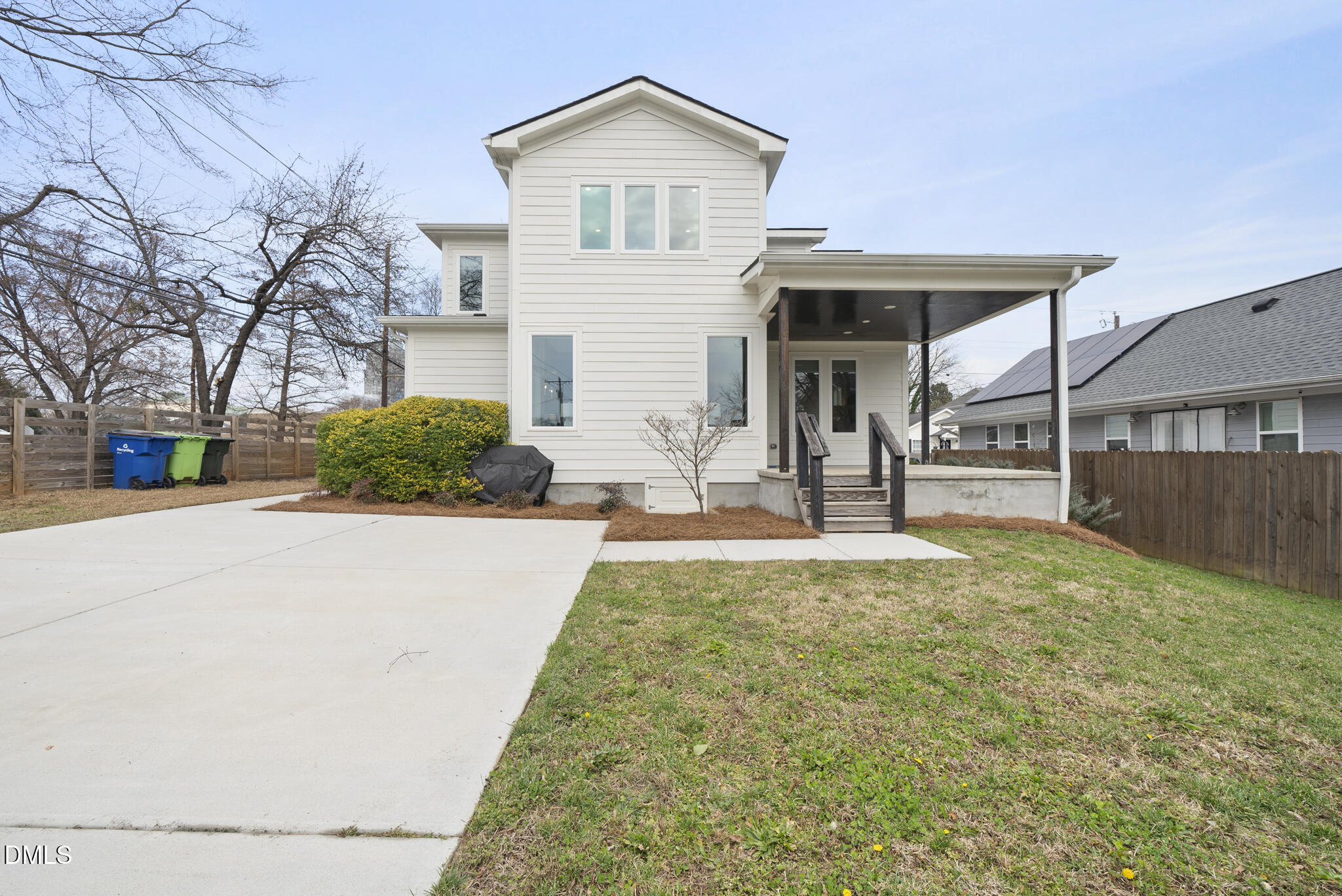200 Bledsoe Avenue Raleigh, NC 27601 - Photo 37 of 42 a view of a house with backyard and a tree