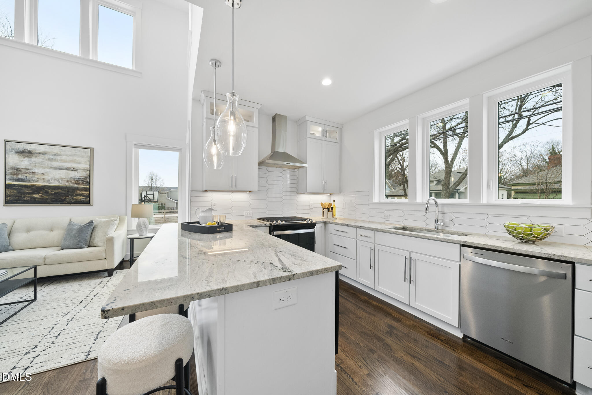 200 Bledsoe Avenue Raleigh, NC 27601 - Photo 8 of 42 a kitchen with a sink stove and cabinets