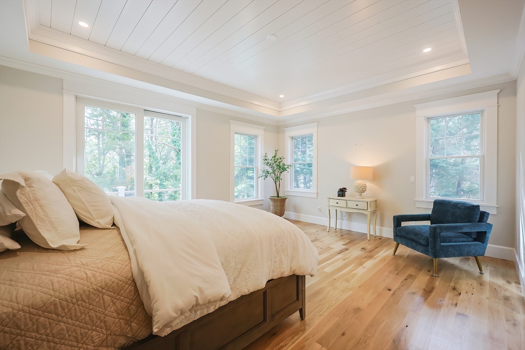 28 Quaker Run Road Mashpee, MA 02649 - Photo 14 of 42 a bedroom with a bed and window