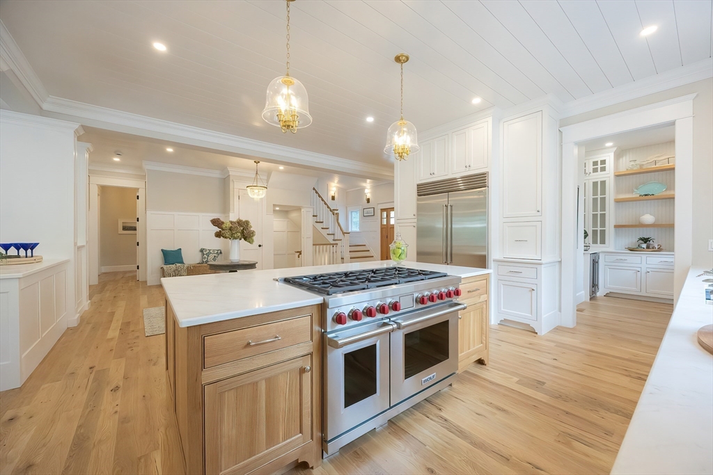28 Quaker Run Road Mashpee, MA 02649 - Photo 6 of 42 a kitchen with a stove oven and sink