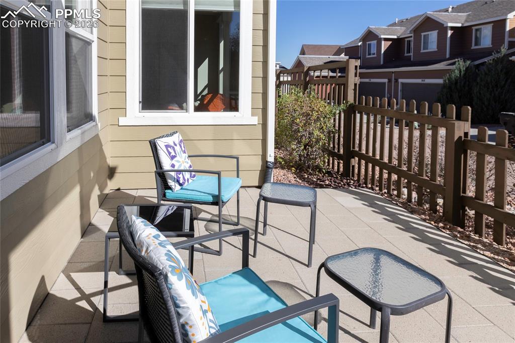 1820 Lower Gold Camp Road Colorado Springs, CO 80905 - Photo 4 of 27 a balcony with table and chairs